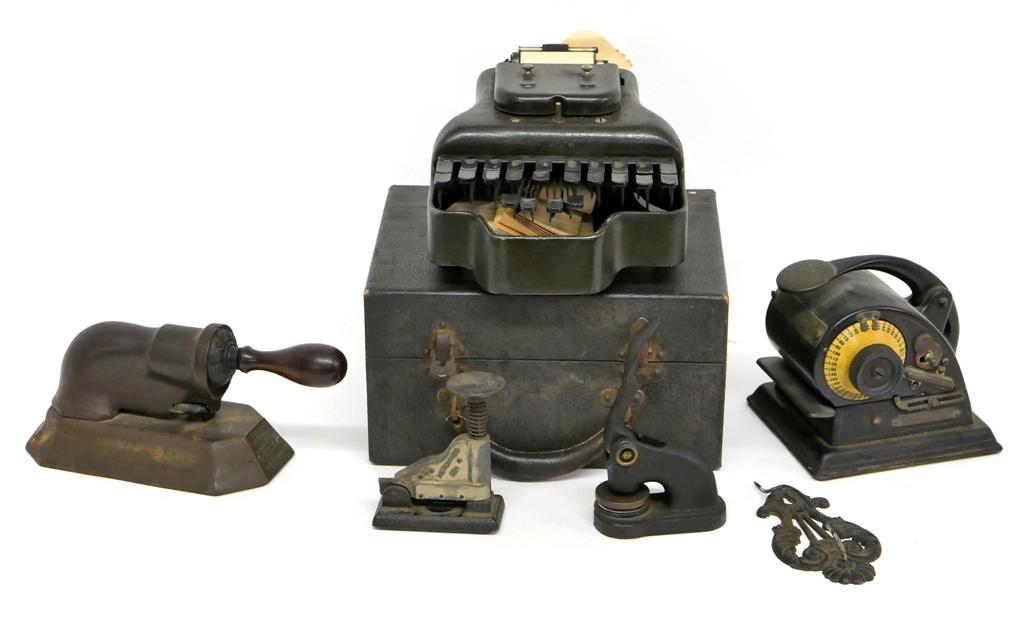 Antique Small Office Equipment: Antique check stamping machine 6"H, Chicago Check Perforator machine, Hotchkiss stapler, iron paper holder, stenographer's typewriter in original case 11"L, seal of Ice Hockey Association Of Philadelp