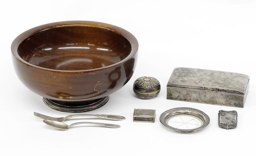 Assorted Sterling Silver Table Articles: Poole sterling silver cigarette box 6.25"W with wood liner, Alvin yo-yo, Tiffany & Co. match box cover, match case with horse heads has dents, small dish with sterling rim, Hallmark Silversmith thick 