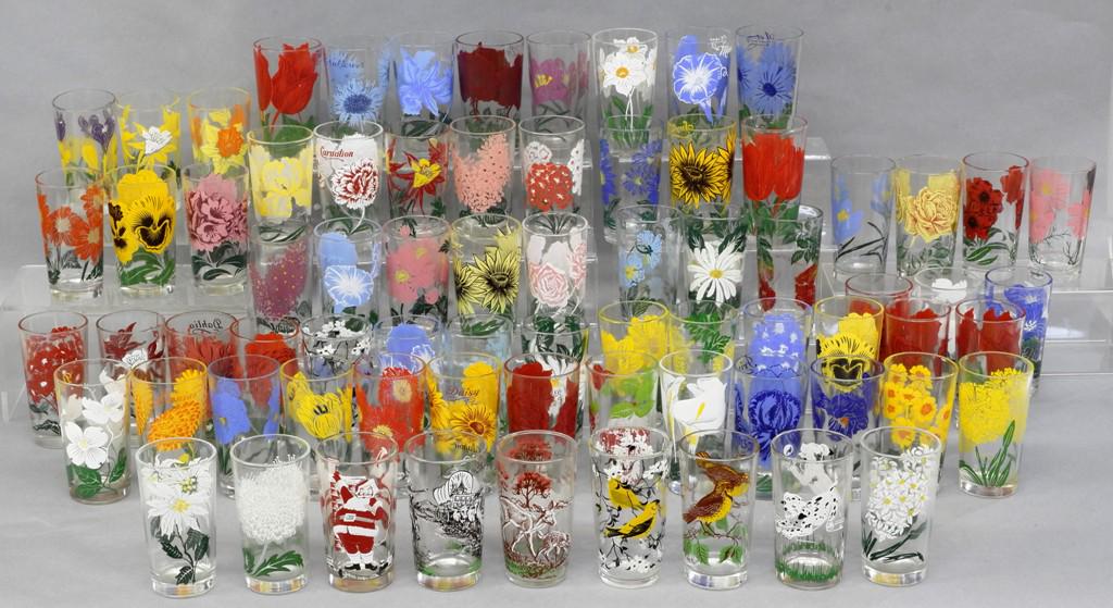 73 Vintage Jelly Glasses & Others: Group of 73 vintage glasses, most are floral, includes Santa, Covered Wagon, Deer & Bird, also includes a boxed set of 4 four roses whiskey glasses