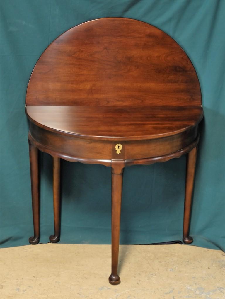 Oldtowne Chippendale Style Game Table: Solid cherry Oldtowne Chippendale style hinged top demilune card table with swing leg, 34"D, 30"H, circa 1980's, buyer must arrange shipping or pick-up