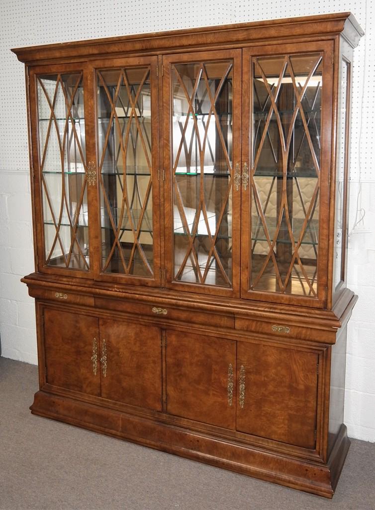 Henredon Charles X China Cabinet: Henredon two piece china cabinet in the Charles X design, mirrored back, glass shelves, 74"W, 19"D, 88"H, buyer must arrange shipping or pick-up
