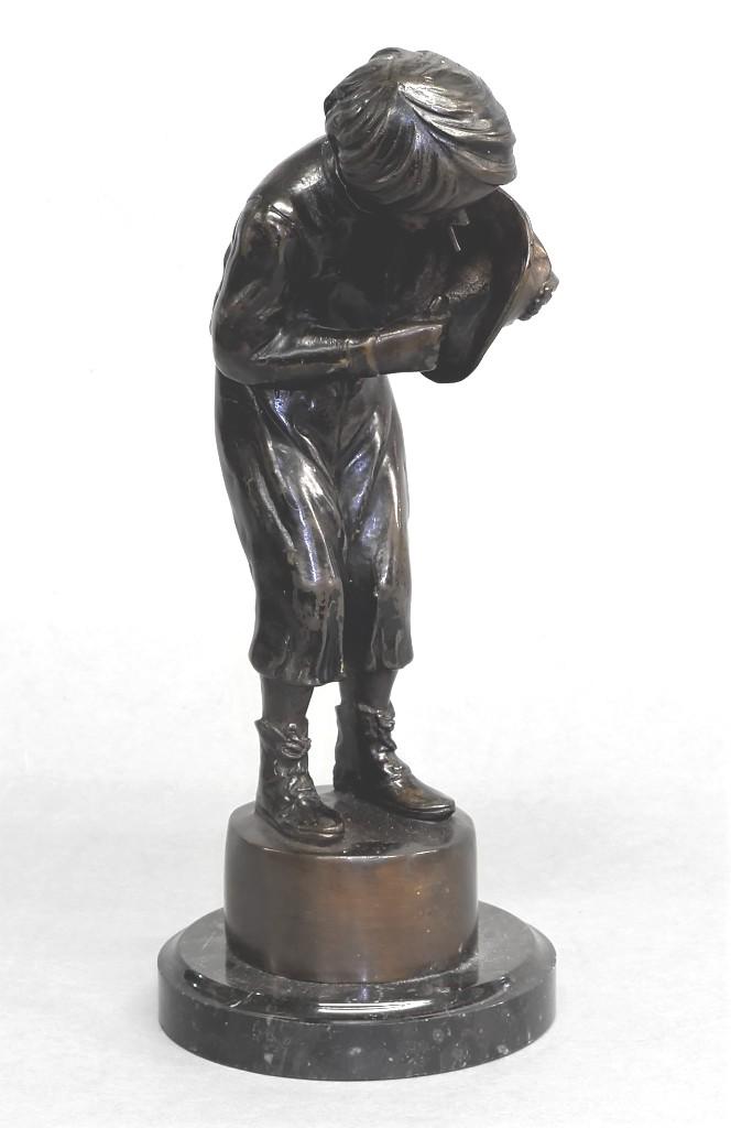 After Moreau Bronze Boy Statue: Signed Moreau after Auguste Moreau, bronze statue of a young boy lighting a cigarette behind his hat, mounted on black marble base, 13"H