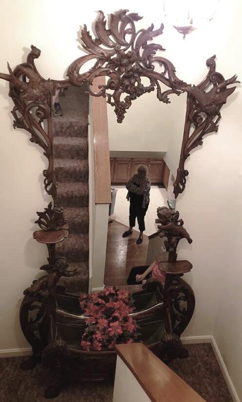 Nine Ft. Fancy Carved Pier Mirror: Esquiste carved Mahogany Pier Mirror nine ft. Tall, with carved Cherbus, SheepHeads and carved Hoof Ft. This is outsantding carving we will have more photos next week. This is a photo from the house. 