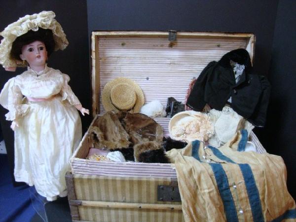 Simon & Halbig # 1159 lady with trunk of clothing: Simon & Halbig #1159 Lady with trunk of clothing, this doll has a very early trunk filled with vintage clothing.