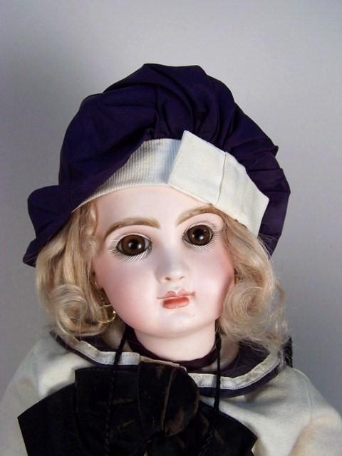 21" Tete Jumeau: 21" Tete Jumeau, #9 Brown eyes, pierced ears, closed mouth, original cork pate & wig on a marked Jumeau jointed body, Vintage Sailor outfit & marked shoes