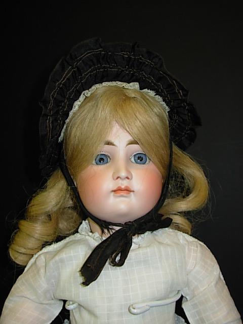 22" Pouty Kestner: 22" Pouty Kestner, marked 14 (size),closed mouth, straight wrist, early jointed body ,plaster pate ,replaced. wig (original wig in bag)