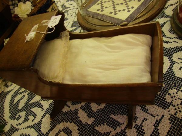 Small Walnut Cradle: Small walnut cradle w/bedding 9" x 13"