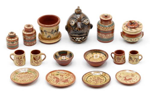 Jane Graber Redware Dollhouse Accessories: Jane Graber southern style face jug 1.25"H, flower pot with saucer, covered crock with bird finial, three sizes of crocks with lids, two bowls, four assorted mugs and four assorted plates