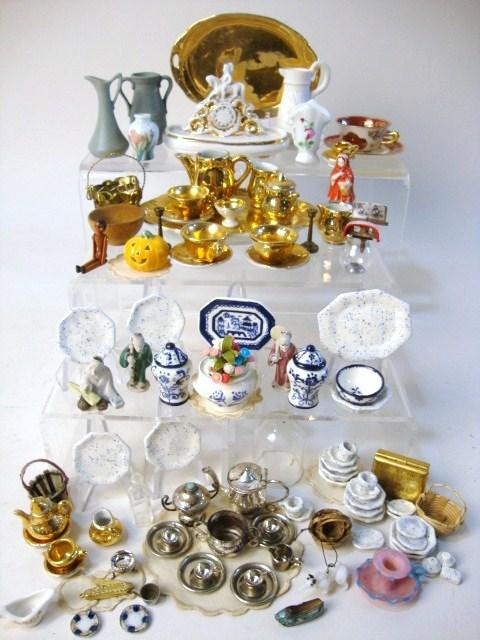 Dollhouse Accessories: Large assortment of dollhouse accessories, includes pottery, gold-tone tea set, artist dinner set, stereo viewer, jointed wooden doll marked BB, etc. 2 1/4" t