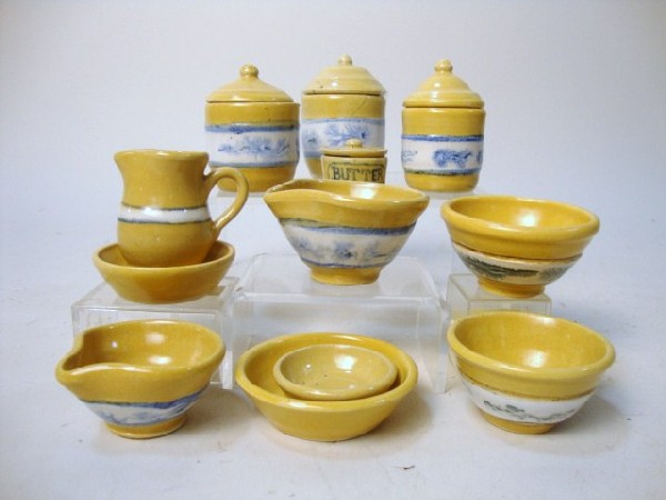 Miniature Yelloware by NS: Miniature yelloware marked NS 1992-1994: mixing bowls, batter bowls, canisters, pitcher, milk bowls, butter crock