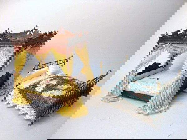 Pair of Handsome Beds: A stunning pair of handsomely dressed beds including a heavy painted brass bed with hand-made log cabin quilt (adhesive residue on headboard), and an elegantly upholstered Bespaq canopy bed with elabo