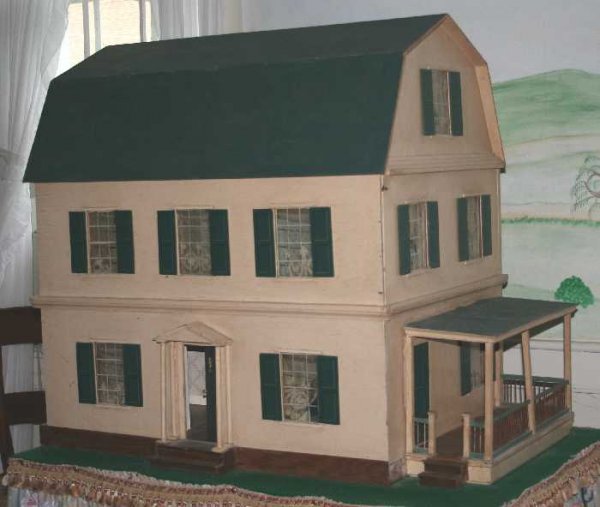 Gambrel-Roof Dollhouse with Porch: A generously sized vintage handcrafted colonial style dollhouse with covered side porch. Front, side & attic openings reveal 8 rooms and central staircase hall, all original net curtains, some origina