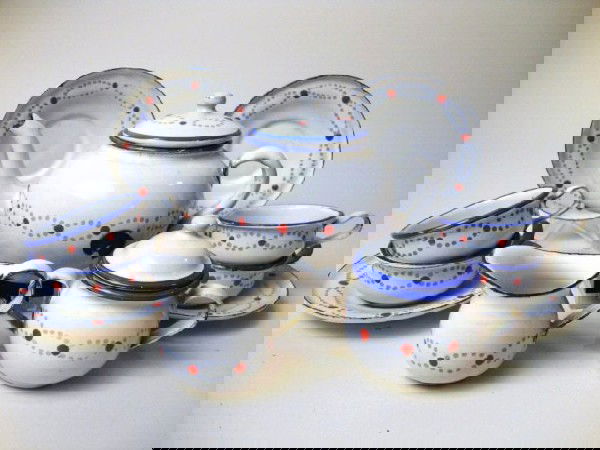 Blue and White Graniteware Tea Set: Child size blue & white graniteware tea set, teapot, sugar, creamer, 4 cups & saucers, 3" t