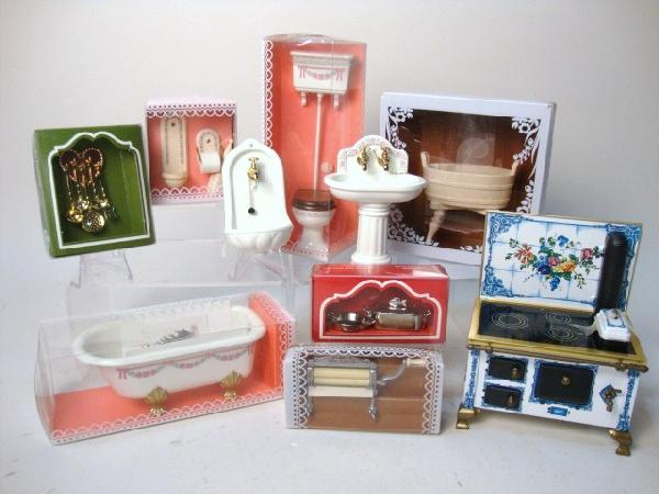 Schopper Stove, Bodo Hennig Items: Schopper tin painted stove, Bodo Hennig toilet, tub, pedestal sink, wall sink, toilet paper & brush, wash tub, wringer, boxed pots, pans, utensils, all are boxed except wall & pedestal sink, 6" t