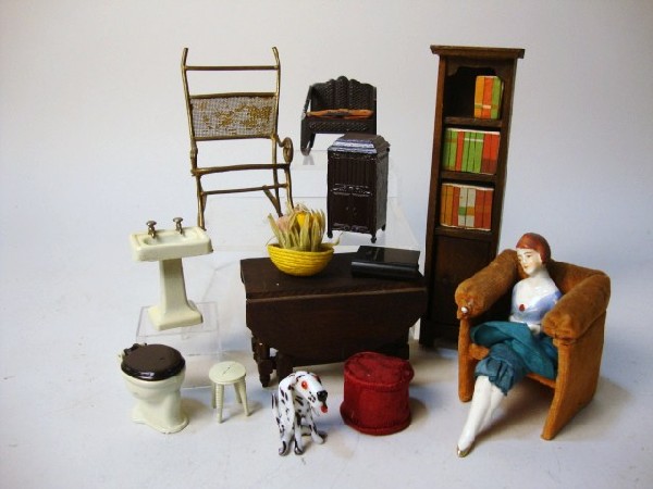 Tootsietoy, Wood table, Bookcase: Tootsietoy Victrola, chair, sink & commode, porcelain doll in velvet chair, etc., 6 1/2" t