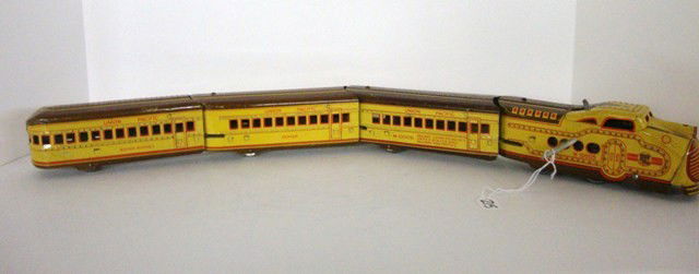MARX Tin 4 pc Wind-up M10005 Streamliner: MARX 4 piece Streamliner M10005 w/clockwork in yellow/brown, lithographed tin, 4 drivers, & orange legtering Union Pacific