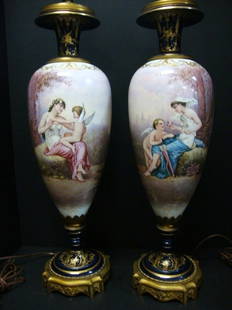 Sevres Hand Painted Lamps: Sevres Lamps 27 "(h), Beautiful Porcelain Urn signed by V. Seccatte w/large hand painted image of maiden w/cupid set w/bronze mounts w/blue & gold pedestal on bronze base