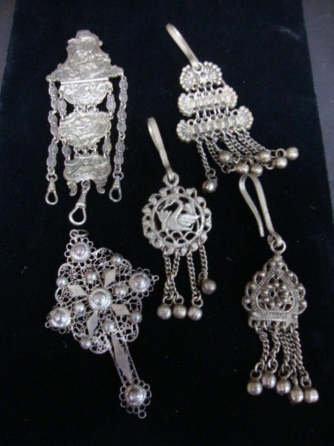 Silver Chatelaine: Highly embossed 800 Silver Chatelaine w/3 links, silver filigree cross, miscellaneous decorative pieces