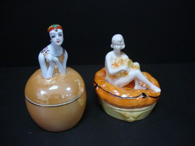 Figural Lady Dresser Jars: Two dresser jars, one Japanese luster ware made by Noritake apple shaped, art deco motif with the bust of a woman wearing a flapper hat on the lid, the other appears to be Royal Bayreuth with a woman 