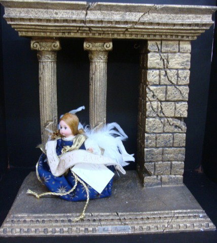 Madame Alexander Nativity: Madame Alexander Nativity with Angel, the Gold Form is 18 x 17 x 11"., it is also a music box, the small angel is also part of this scene. This comes with the original shipping box, 18 1/2" x 17" x 11