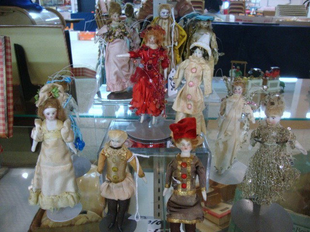 Dollhouse Dolls: Eleven German all Bisque dolls, dressed for a Toy Theatre, circa 1890's, beading, painted mustache, wonderful period costume, all have string on top of head for a show, dolls are all bisque, 6", great