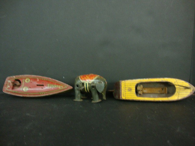 Tin Wind-up elephant and Boats: tin Wind-up elephant, Miss american by Lindstrom, Keystone Boat, 9" largest This is a parts lot, they are all as is