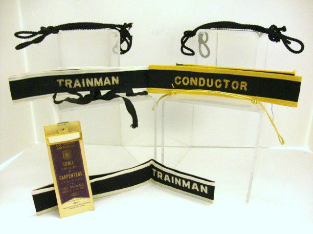 Trainman's Hat Bands and Trim: Lot of Trainman's hat trim including 2 Trainman & 1 Conductor hat band, gold hat trim, 4 black hat trims, string tie, Iowa carpenter's connection ribbon