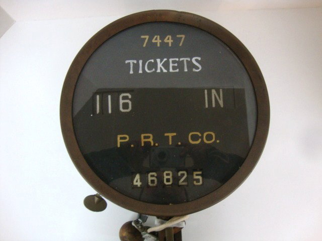Trolley Car Ticket Register: Philadelphia Rapid Transit Trolley Ticket Register w/mounting bracket, face has #7447 P.R.T. Co. "116 In" and 46825 total passengers, 10 3/4" (di) x 3" (d)