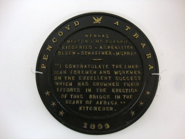 Railroad Bridge Builders Plate: Cast Iron Pencoyd Iron Co. Atbara 10 1/2" (di) railroad bridge builders plate 1899, names at top are Wennas, Melton, McQuarrie, Siegfried, Aspenhter, Olsen, Schaffner, & Murray, bridge in heart of Afr