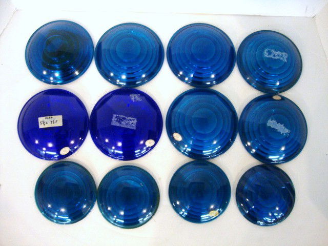 Glass Lenses: Twelve glass lenses 1 Kopp, 2 blue 4 1/2" x 3 1/2" corning, 2 blue/green 5 3/4" x 3 1/2", kopp 2 b/ue/green 4 1/2" x 3" F.S. 1935, 4 green/blue kopp 5 3/8" x 3 1/2", 2 cobalt blue 5 3/8" x 3 1/2" ko9p