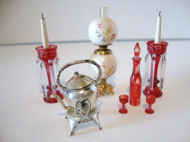 Chestnut Hill Accessories: An assortment of early accessories by Chestnut Hill including globe lamp 2" H, pair of Bohemian glass lustres, sterling teapot on stand and red glass decanter set.