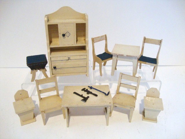 Vintage Painted Dining Room Furniture: Vintage German dining or kitchen furniture comprising a cupboard 5" H, two tables, four chairs and a covered stool, and a pair of lidded pantry boxes. Some paint loss on the older chairs.