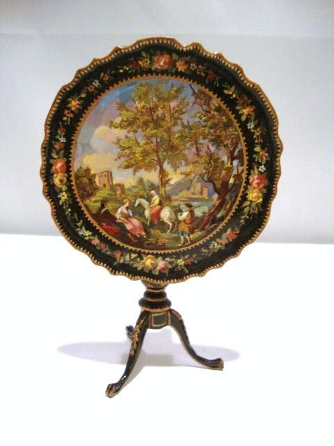 Natasha Flip-top Table: Exquisitely hand-painted tripod table with pie-crust table-top featuring a beautifully executed pastoral scene. 2.5" H. One foot repaired.