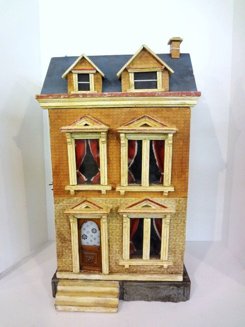 Gottschalk Blue-roof Dollhouse: A pretty early Gottschalk house, professionally restored with repainted roof, replaced papers inside and out. Two interior rooms, curtains replaced. 24.5" H, 13.5" W, 10.5" D.