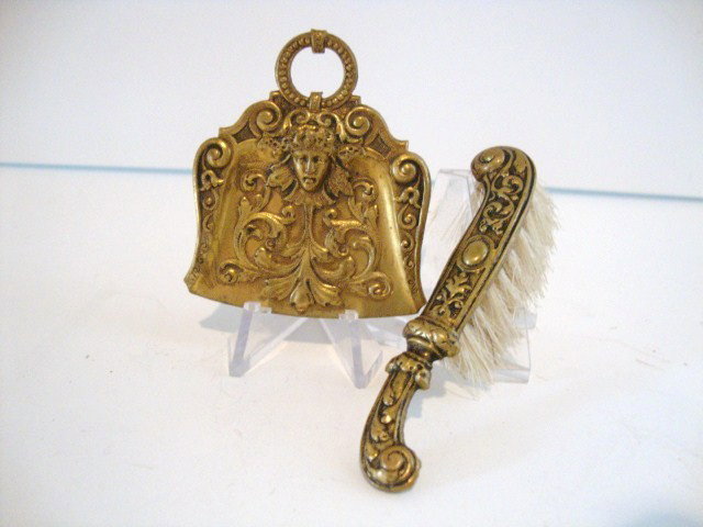 Ormolu Dustpan and Brush Set: Antique ormolu dustpan 2" X 2" with matching brush retaining all its bristles.