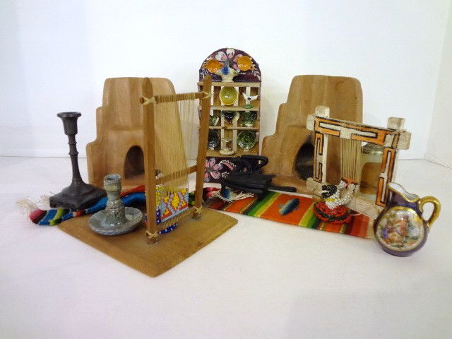 A Visit To Mexico: Vintage souvenirs from Mexico including a pair of terracotta fireplaces 5" H, beaded weaving ladies, a shelf of pottery and a large group of small painted figurines.