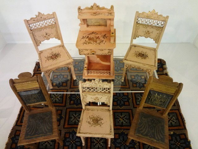 German Dollhouse Chairs & Etagere: Three German pink painted chairs with gilt decoration and etagere with one drawer. Chairs 5" H, etagere 5.5" H, two leather back and seat Nouveau style chairs 5"H, 10 x 15" Arts & Crafts style rug.