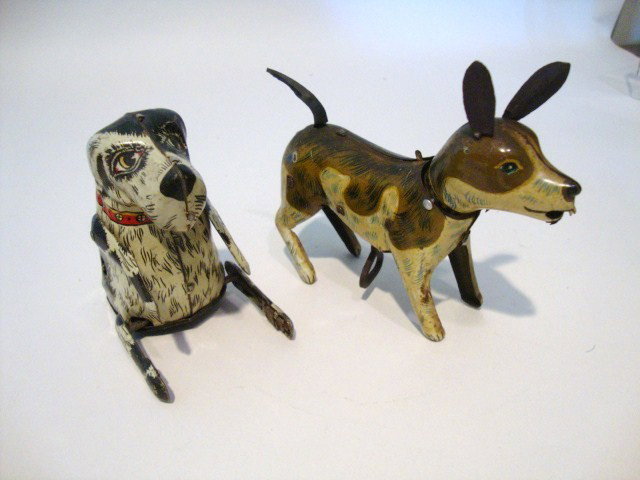 Tin Litho Dog Wind-up Toys: Flipo the Jumping Dog, 4" (t), Marx 1940, & tin litho wind-up dog, made in Japan, approximately 5" (l), tail spins & head nods when wound