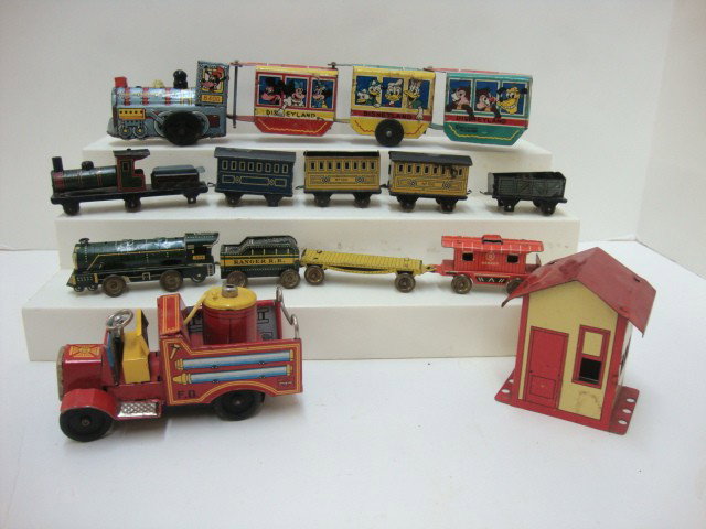 Tin Disney Train and Penny Toy Train: Disneyland Express Train in tin, Penny toy Train, Ranger RR tin train, Marx Fire Department Truck, and Erector Tin Station 3" tallest