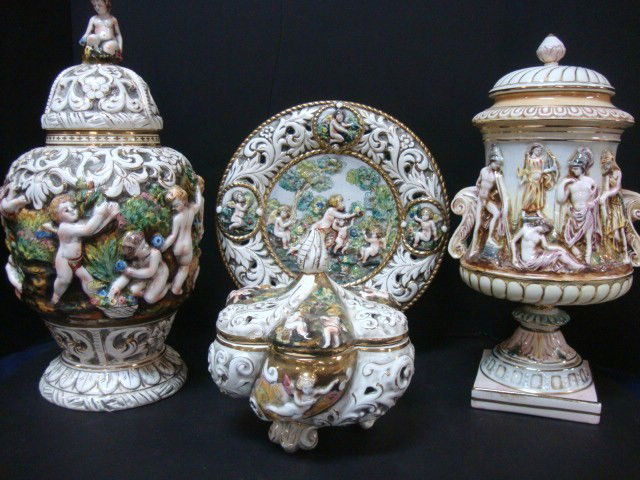 Four Capodimonte Decorative Porcelains: Covered Dish Bernini 8" 702, Charger 12" 716, Covered 18" Ginger Jar 429, Covered Jar 16 1/2", all highly adorned w/cupids & figures