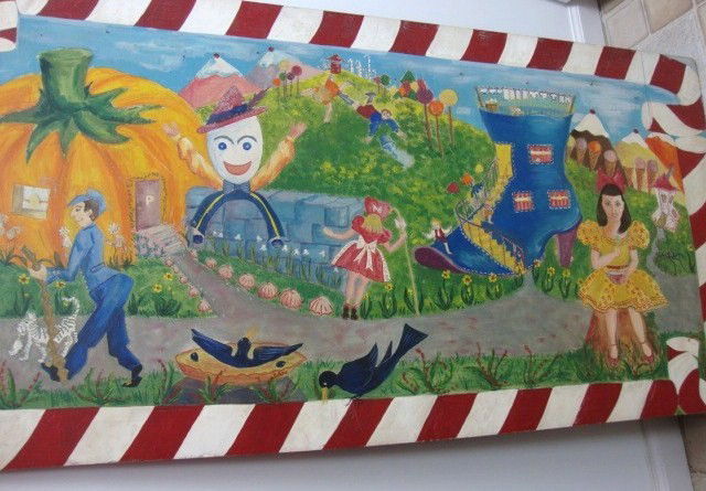 Nursery Rhyme Painting on Masonite: Whimisical Candy Land Painting on Masonite, this has Candy Canes, Lollypops, Ice Cream, Fairytale Characters, this is just fun! It is 48 x 24", quite large, but colorful, and exciting! This was painte