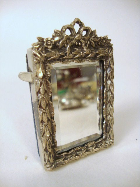 Meyers Napoleonic Vanity Mirror: Meyers Napoleonic vanity mirror with floral and garland border, 2.5" H.