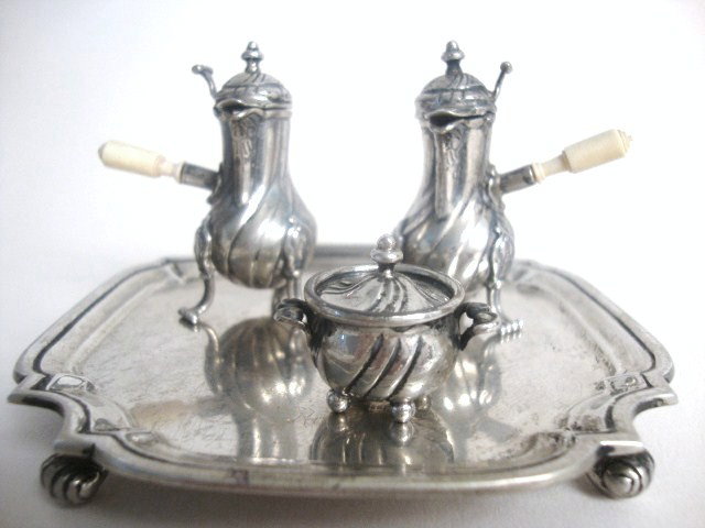 Meyers Louis XV Café au Lait Coffee Service: Meyers Louis XV café au lait service after F. R. Fenin, France 1770, having two pots on three feet with pyriform fluting and ivory handles, sugar on four feet with lid. Pots 2" H, tray 3.50 " L, pots