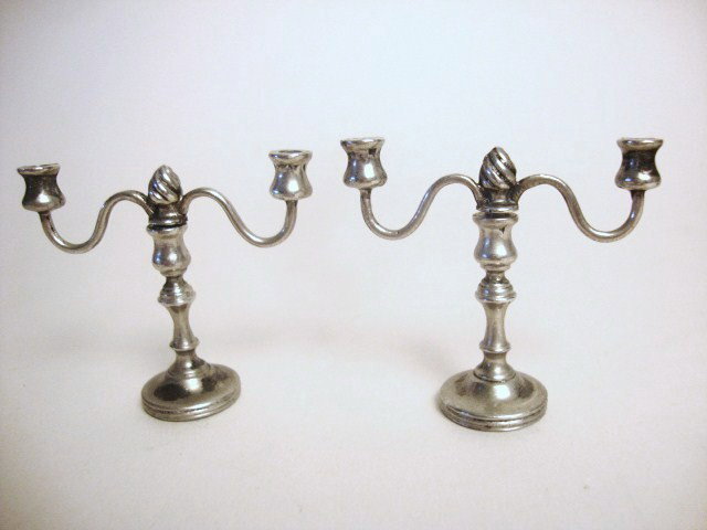 Meyers George III Pair Candleabra: Meyers George III pair of candleabra, with flame center and round base 2" t, marked M Sterling, hand made