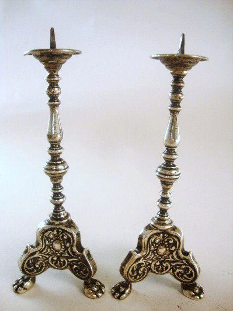 Meyers Pair of Austrian Church Candlesticks: Pair of sterling candlesticks copied from the Austrian Cathedral of St. Stephen, 4.3" H, with wide base of high relief work on three paw feet, signed "M" on bottom of paw