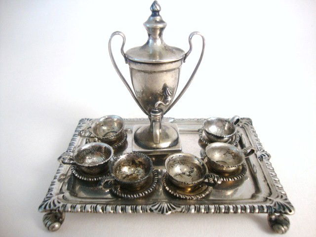 Flaxman George III Coffee Urn with Tray: Flaxman coffee urn after Thomas Chamer, London 1785, urn on square base with four ball feet. 2.5" H, it has removable lid with finial style top, and reeded handles. Six cups and saucers copied from En