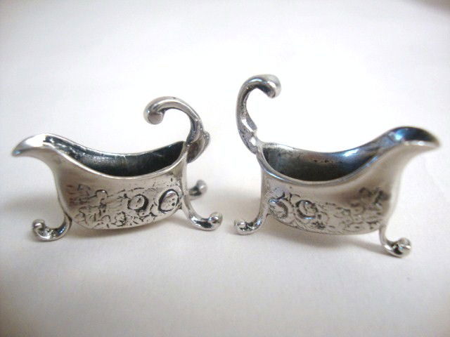 Meyers Two George II Gravy Boats: Two George II gravy boat, highly chased, after Thomas Swift London 1741, .50" Marked with "M" Sterling, one does not have M