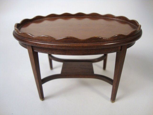 Oval Mahogany Occasional Table: Similar to the previous lot, but slightly smaller, Hepplewhite style tea table with scalloped decorative gallery, 5.5" L, 4" W and 3.75" H.