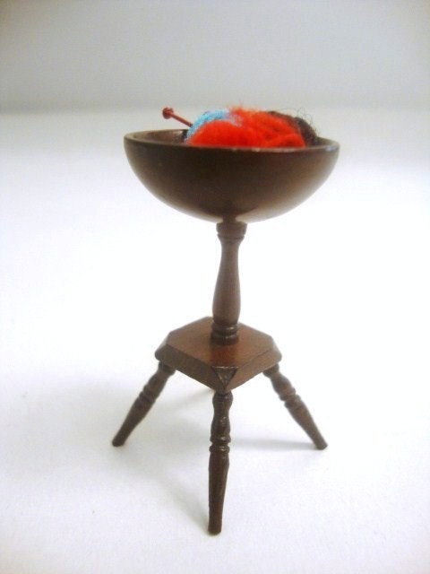 Eric Pearson Knitting Bowl: Small mahogany knitting bowl on four-legged stand, wonderful finish. 1.75" H, barely 1" W and D.