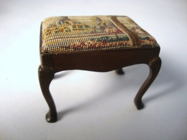 Eric Pearson Petitpoint Bench: Mahogany Queen Anne bench with antique petitpoint embroidered seat. 2" L, 1.5" H and 1.25" W.